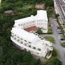【再度公告】沖縄科学技術大学院大学シーサイドハウス改修事業設計その他(